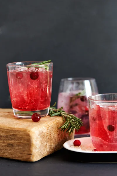 Glass of water with cranberry — Stock Photo, Image