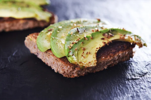 Bread with avocado — Stock Photo, Image