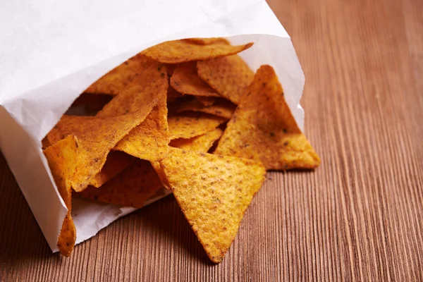 Tortilla chips in paper bag — Stock Photo, Image