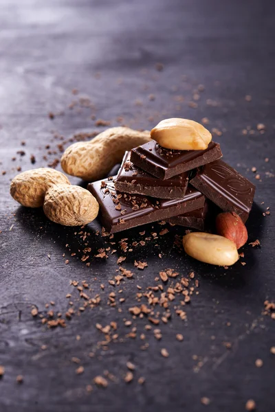 Chocolate and peanuts — Stock Photo, Image