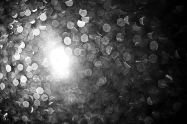 Bokeh raindrops on glass at night, defocused. — Stock Photo, Image