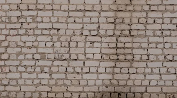 Pozioma ściana z białego cegły. Ściana fundamentowa. Tekstura. — Zdjęcie stockowe