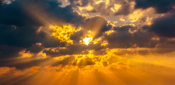 Cloud sun beam ray light warm orange color — Stock Photo, Image