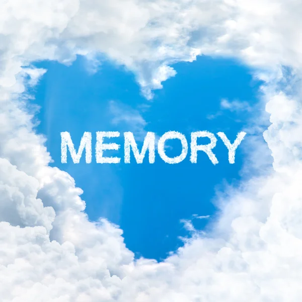 Slovo láska paměti na modré obloze — Stock fotografie