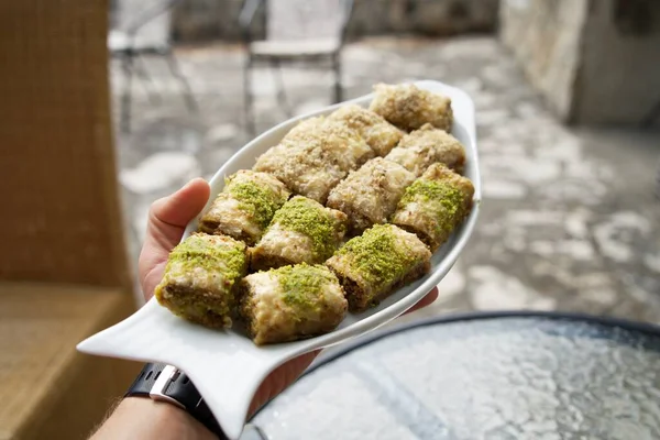 Baklava with pistachios and walnuts. Eastern sweets, Turkish cuisine.