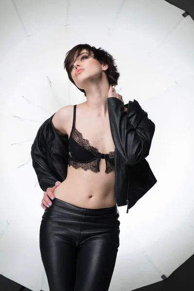 Beautiful Young Woman Short Dark Hair Posing Studio Leather Clothes — Stock Photo, Image