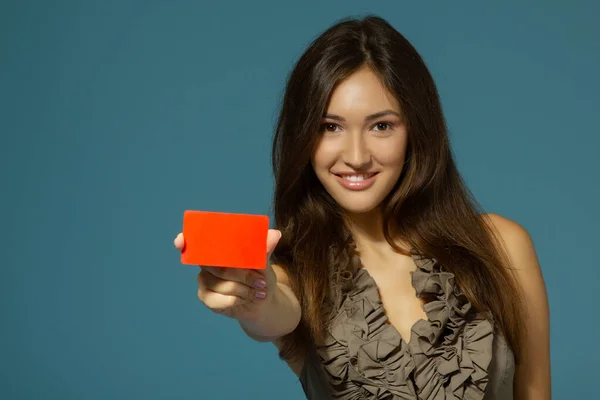Beautiful Friendly Smiling Confident Girl Showing Red Card Hand Blue — Stock Photo, Image