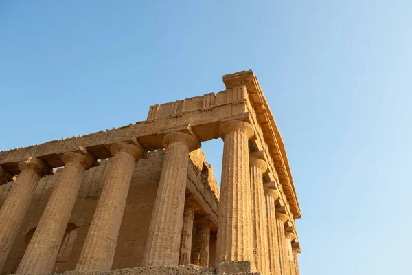 Valley of the Temples (Valle dei Templi), an ancient Greek Temple built in the 5th century BC, Agrigento, Sicily. Famous tourist attraction in Italy. Old marble columns of the Doric order. Travel destination