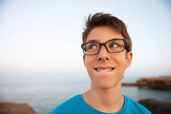 Funny Young Boy Sly Expression His Face Thinks Something Looking — ストック写真