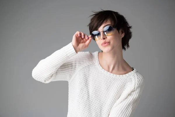 Attractive Caucasian Girl Shot Dark Hair Sunglasses Gray Background Young — Stock Photo, Image