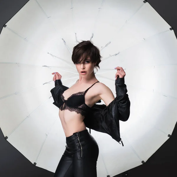 Beautiful Young Woman Short Dark Hair Posing Studio Leather Clothes — Stock Photo, Image