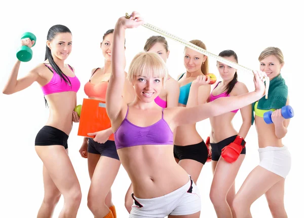 Fitness tjejer över vit bakgrund — Stockfoto