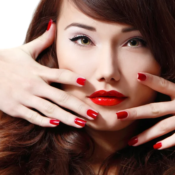 Woman with long hair, red lipstick and manicure — Stock Photo, Image