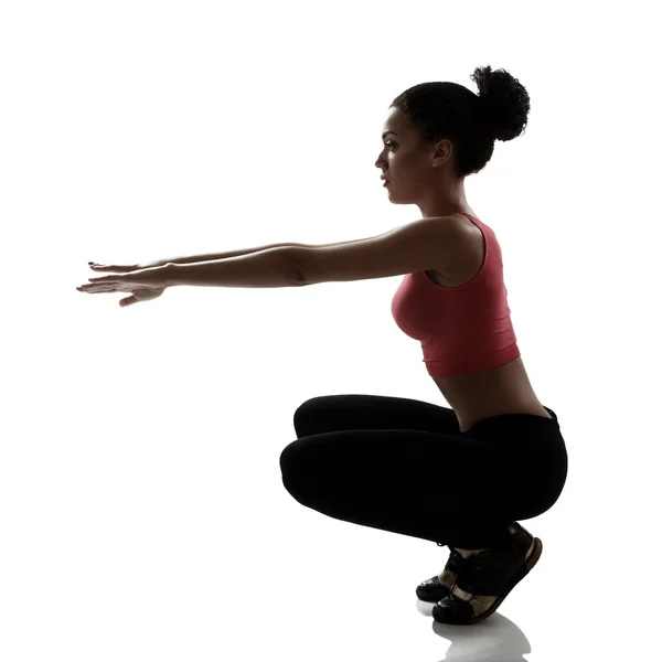 Sport woman  doing squatting exercise — Stock Photo, Image