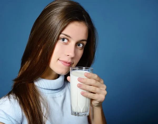 Girl drinking milk — Stock Photo, Image