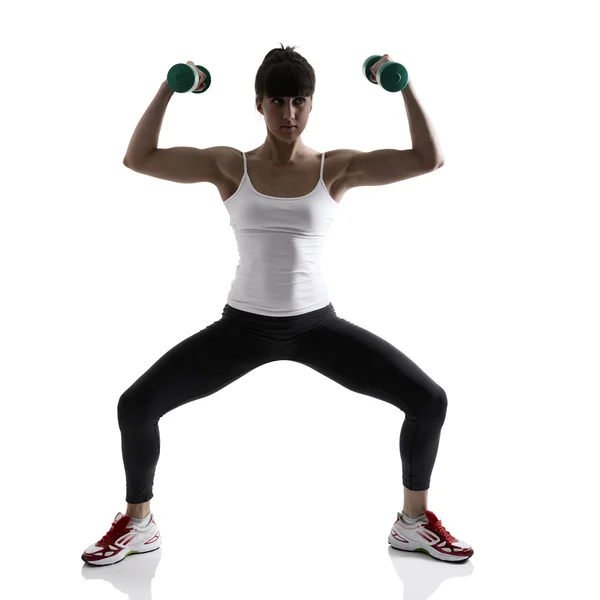 Woman with  dumbbells — Stock Photo, Image