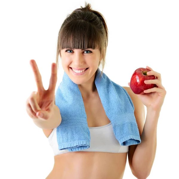 Fitte Frau mit Apfel — Stockfoto