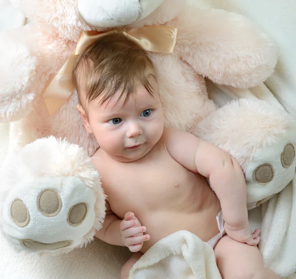 Baby boy with bear toy — Stock Photo, Image