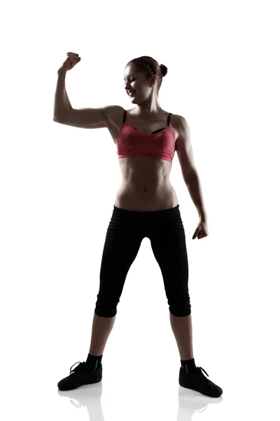 Esporte mulher mostrar bíceps — Fotografia de Stock
