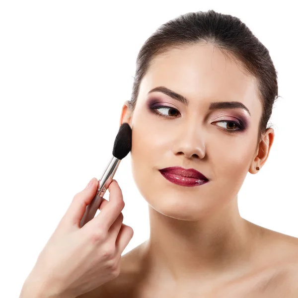 Woman face with brush — Stock Photo, Image