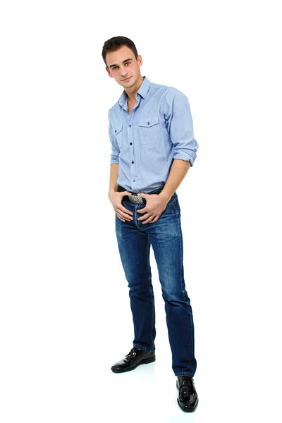 Jovem de camisa azul e jeans — Fotografia de Stock