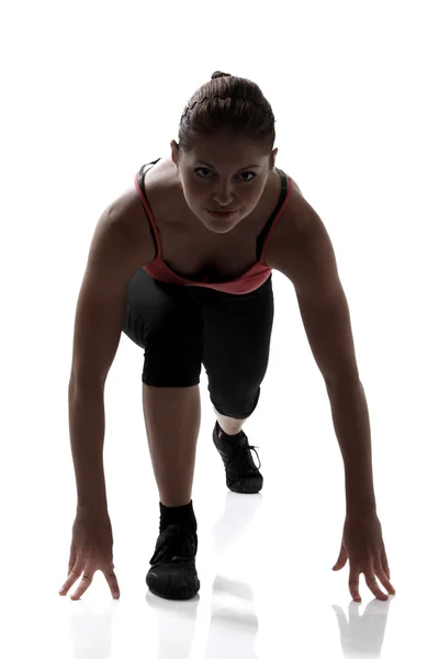 Comienzo bajo, la mujer del deporte va a correr — Foto de Stock