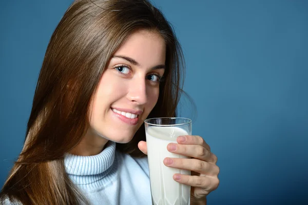 Woman drinking milk — Stock Photo, Image