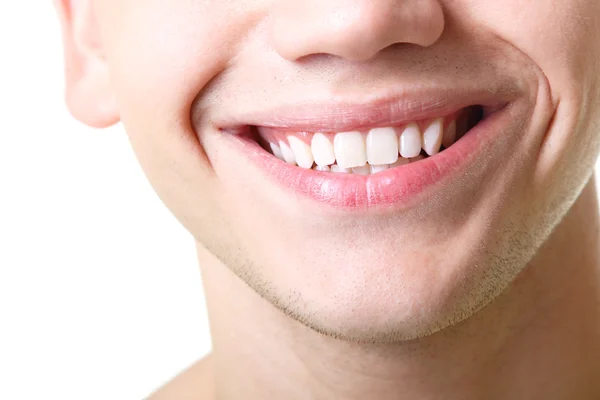 Людина з великими білими зубами — стокове фото