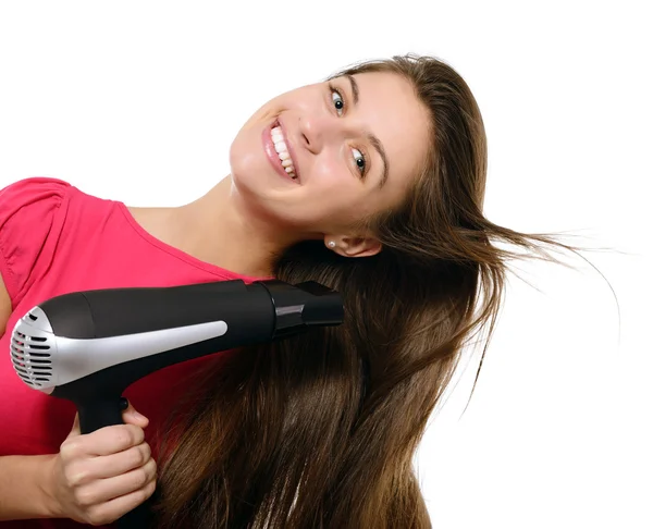 Girl blows dry hair — Stock Photo, Image