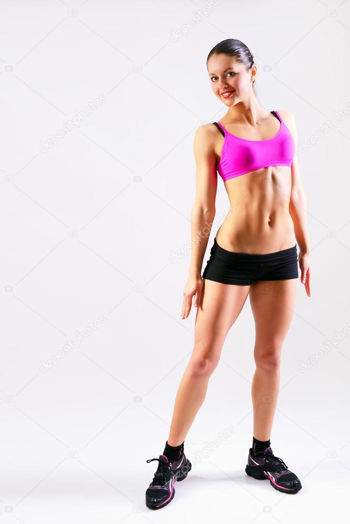 Fitness girl over white background