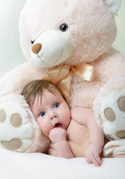 Infant baby boy with big toy bear — Stock Photo, Image