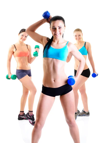 Fitness dívky nad bílým pozadím — Stock fotografie