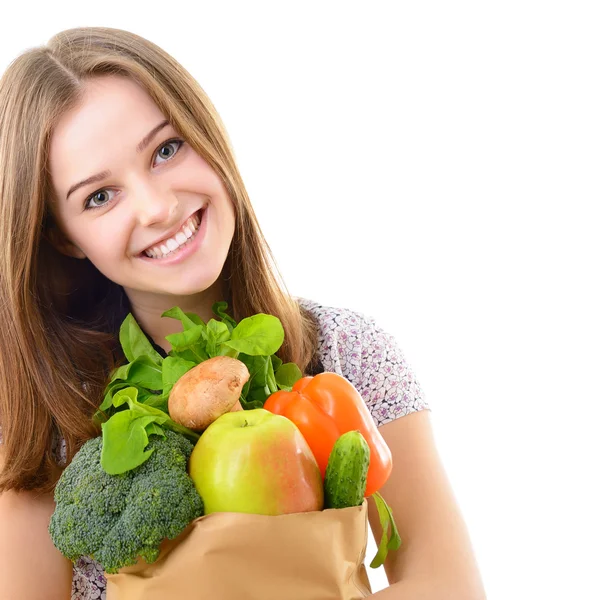 Girl holding   grocery bag — Stock Photo, Image