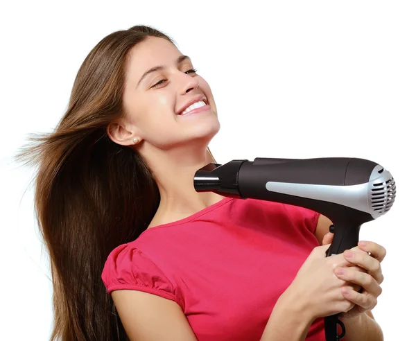 Girl blows dry hair — Stock Photo, Image