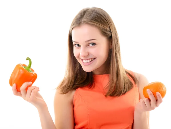 Vrouw bedrijf peper en Mandarijn — Stockfoto