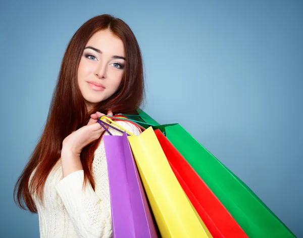 Vrouw met boodschappentassen — Stockfoto