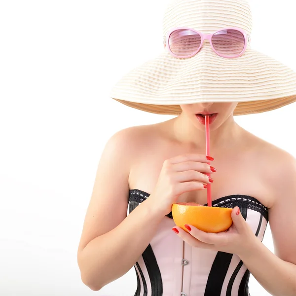 Pinup girl drinking juice — Stock Photo, Image