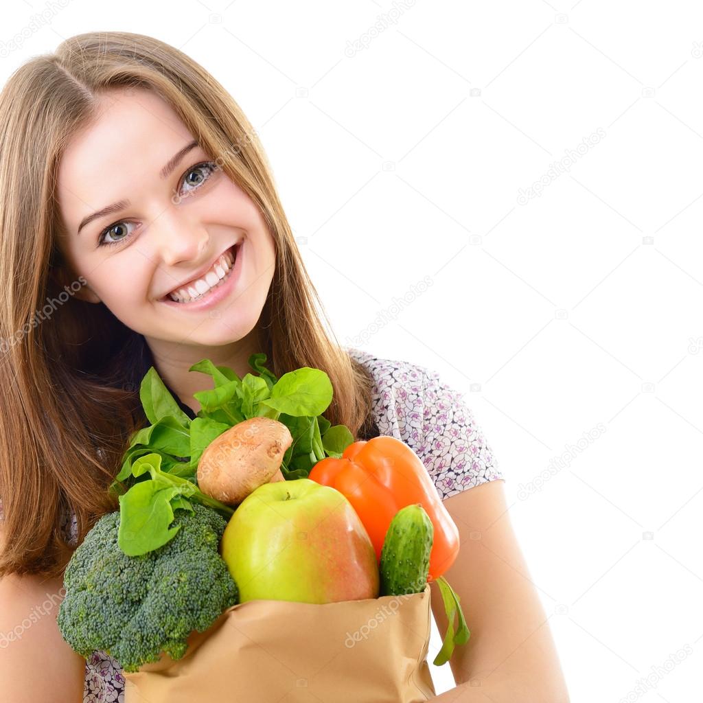 girl holding   grocery bag