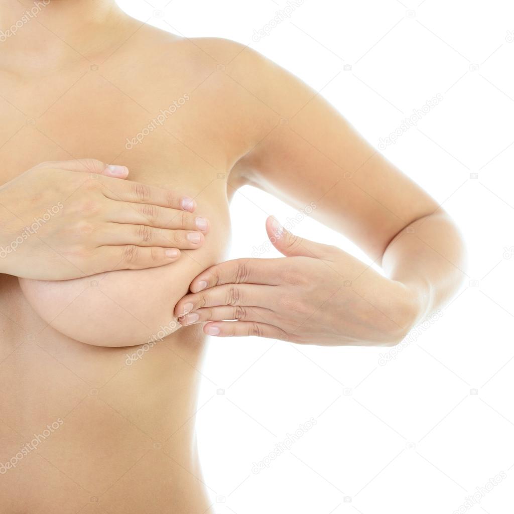 Woman  examining her breast of mastopathy