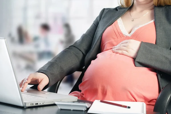 Working during pregnancy Royalty Free Stock Images