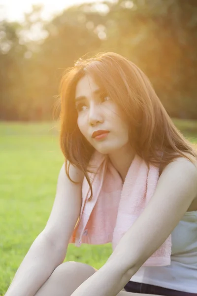 Woman Sitting after jogging. — Stock Photo, Image