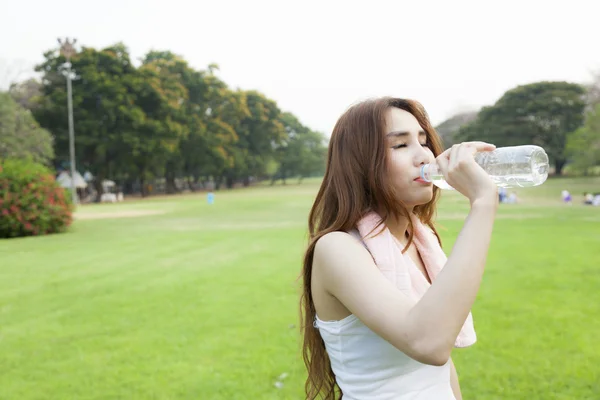 Woman standing rest after jogging. — Stock Photo, Image