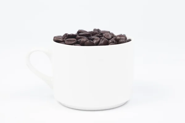 Kaffekopp med kaffebönor — Stockfoto