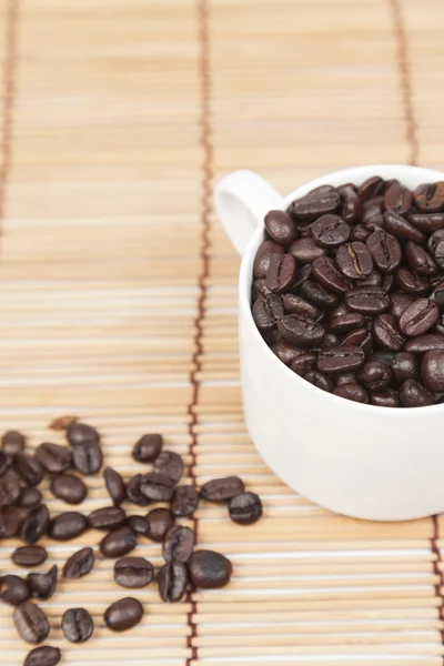 Tasse à café et grains de café — Photo