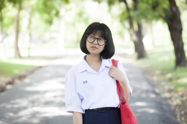 Schoolmeisje. Rode draagtas — Stockfoto