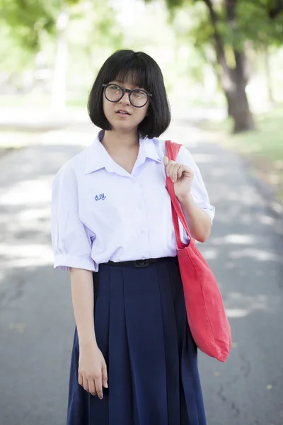 Schoolgirl. Red carrying bag — Stock Photo, Image