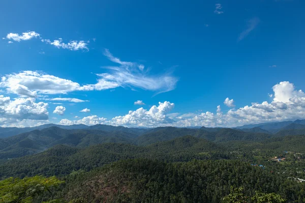 Forested mountains and sky. — Stock Photo, Image