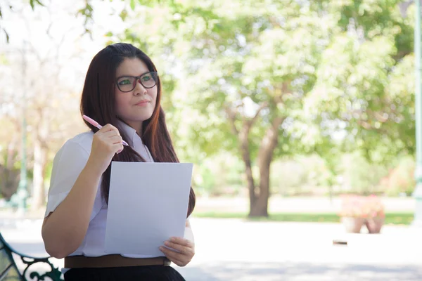 Student wearing glasses that hold documents — Stock Photo, Image