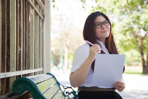 Student wearing glasses that hold documents — Stock Photo, Image