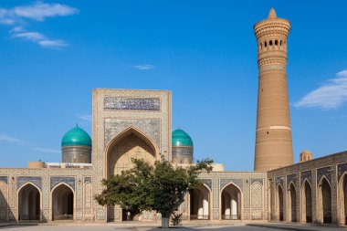 Mir-i Arab Madrasah, Mosque Kalon and Kalyan minaret, Historic centre of Bukhara, Uzbekistan (UNESCO World Heritage) clipart